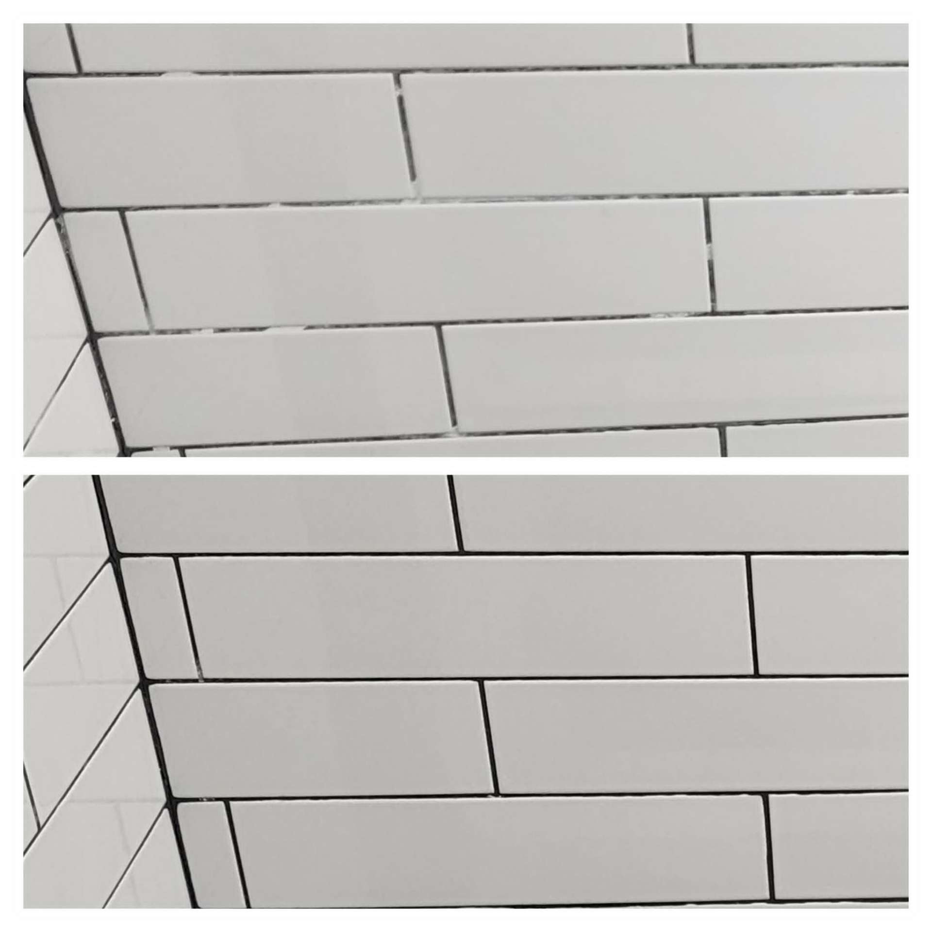 White subway tile bathroom in Chandler AZ with bleached and yellowed grout before Lazona color seal restoration